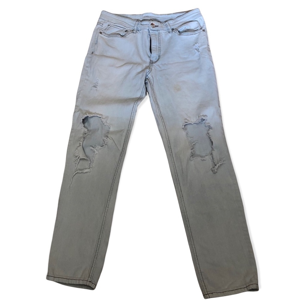 Original use highly distressed light washed jeans, size 34